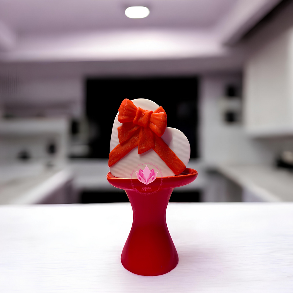 3D printed Valentine’s Day heart chocolate box clicker with chocolate details designed for fidget sensory play.