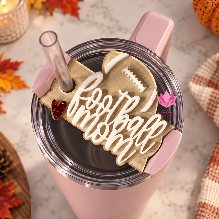 Football Mom acrylic tumbler topper designed for a Stanley H2.0 Quencher tumbler 20 and more