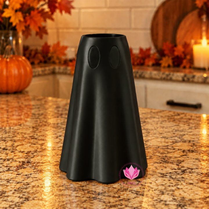 Black 3D printed ghost drink holder for 12 oz slim cans with Halloween inspired design.