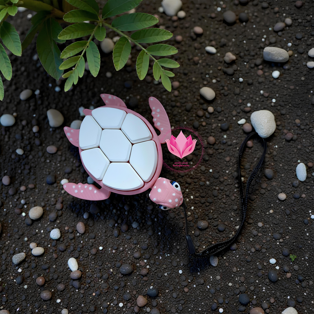 Pink turtle 3D printed clicker fidget sensory toy with seven clickable buttons