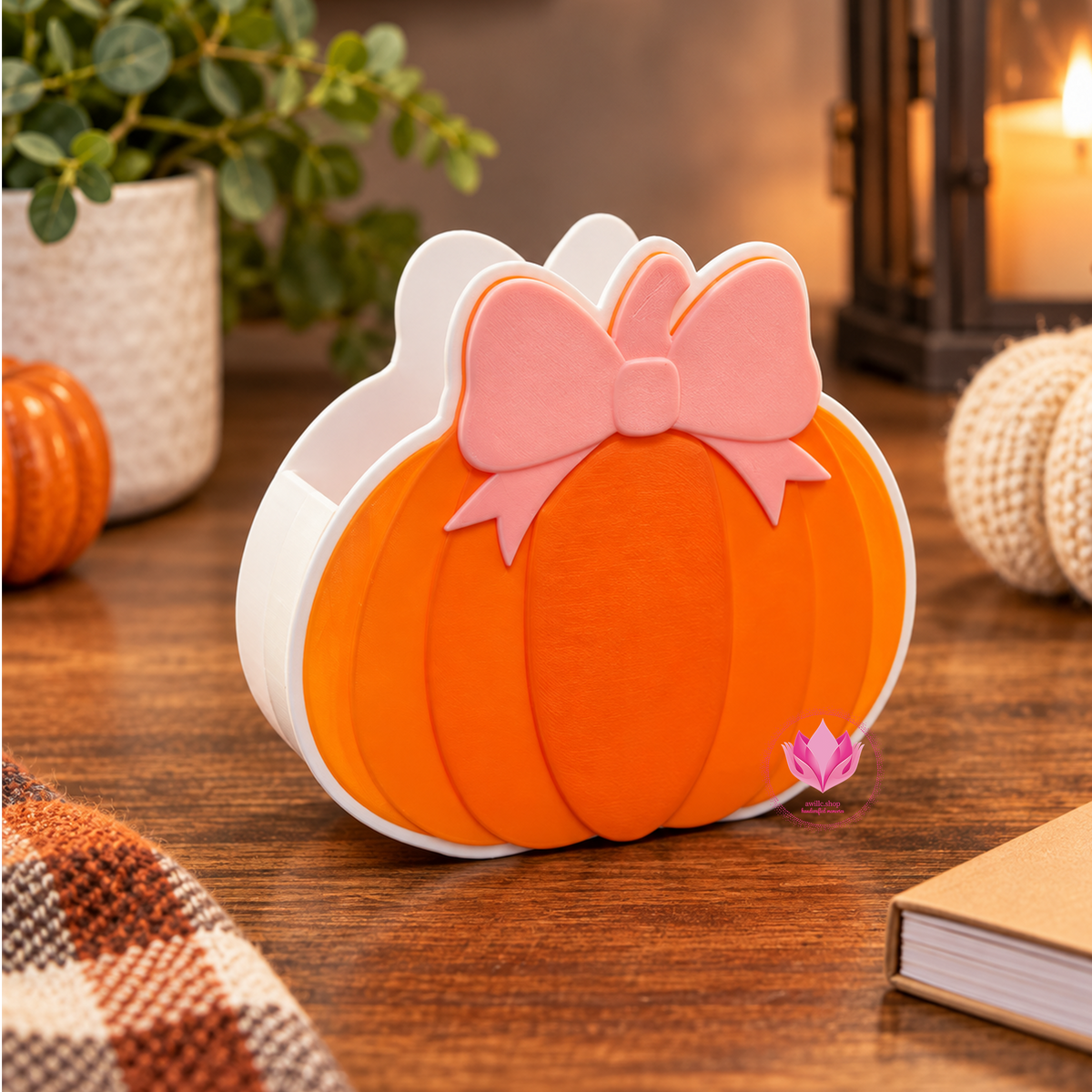 Orange and white 3D printed pumpkin gift box with pink bow for fall gifting and seasonal décor