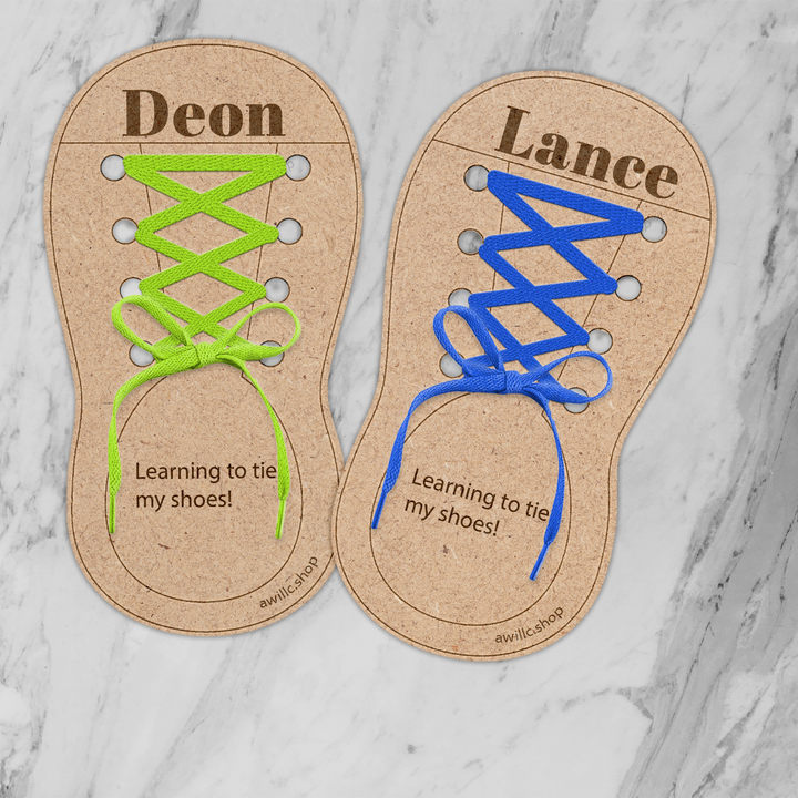 Personalized wooden learning shoe with engraved name and colorful laces for practicing shoe tying skills.