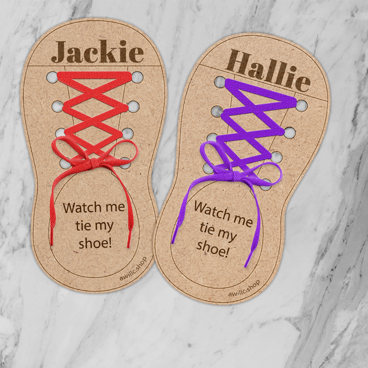 Personalized engraved wooden shoe tying practice tool with colorful laces for children learning how to tie their shoes.